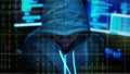 Hacker in a hoody with computer background