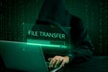 Hacker initiating file-transfer with binary code background. Royalty Free Stock Photo
