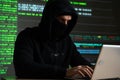 Hacker internet computer crime cyber attack network security programming code password protection Royalty Free Stock Photo