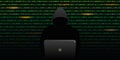 Hacker is looking for passwords cybercrime with binary code background