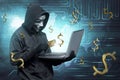 Hacker man with mask holding credit card with laptop on his hand