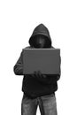 Hacker with mask holding laptop while typing Royalty Free Stock Photo