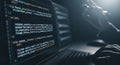 Hacker or Programmer Working on Laptop with Illuminated Code Screen in Dark Environment Royalty Free Stock Photo