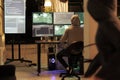 Hacker running malicious software code on computer, hacking database