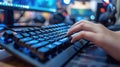 A hacker\'s fingertips glide over the keyboard in a close-up view, highlighting the precision and speed of their digital Royalty Free Stock Photo