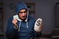 The hacker with sack of money Royalty Free Stock Photo