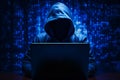 A hacker or scammer using laptop computer on dark technology background, phising, online scam and cybercrime concept. Generative Royalty Free Stock Photo