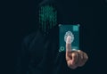 Hacker is scanning fingerprints in the dark. Concept of information security in internet networks and espionage Royalty Free Stock Photo