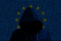 Hacker shininhg through european computer code flag