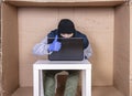 Hacker shows thumbs up, good internet security idea