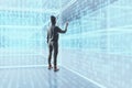 Hacker standing in glowing cyber binary code room. Technology concept Royalty Free Stock Photo