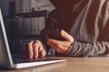 Hacker stealing data from jailbroken phone and attacking connected networks and systems Royalty Free Stock Photo