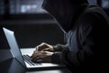 Hacker stealing data from laptop in dark room. Cybercrime concept. Generative AI Royalty Free Stock Photo