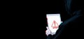 Hacker tablet cyber security. Digital mobile phone in hacker man hand isolated on black banner. Internet web hack