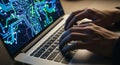 Hacker Typing Code on Digital Circuit Laptop Royalty Free Stock Photo
