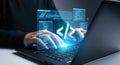 Hacker typing on laptop keyboard with glowing code and programming symbols Royalty Free Stock Photo