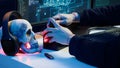 Hacker uploading script on SSD that can launch DDoS attacks on any website