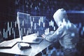 Hacker using computer with business chart Royalty Free Stock Photo