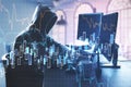 Hacker using computer with business chart Royalty Free Stock Photo