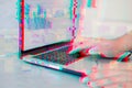 Hacker using computer and code graph bar data analytsis element for cyber technology concept with glitch