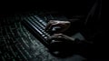 Hacker using computer keyboard with binary code on dark background. Royalty Free Stock Photo