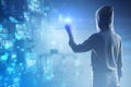 Hacker using creative binary coding hologram on blurry background. Software programming code and hacking. Royalty Free Stock Photo