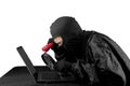 Hacker using flash light and magnifying glass. Royalty Free Stock Photo