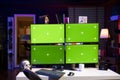 Hacker using green screen PC, coding malware designed to exploit backdoors Royalty Free Stock Photo