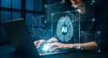 Hacker using laptop with AI and data visualization Royalty Free Stock Photo