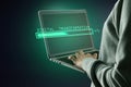 Hacker using laptop computer with abstract glowing loading bar on gray dark background. Digital transformation, hacking, internet Royalty Free Stock Photo