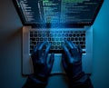 Hacker using laptop computer, cyber attack risk concept Royalty Free Stock Photo