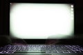 Hacker using laptop. Lots of digits on the computer screen Royalty Free Stock Photo