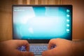 Hacker using laptop. Lots of digits on the computer screen Royalty Free Stock Photo