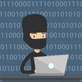 Hacker using laptop to steal information.