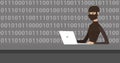 Hacker using laptop to steal information. Royalty Free Stock Photo