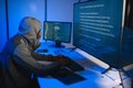 African american Hacker Using Multiple Computers For Stealing Data On Desk Royalty Free Stock Photo