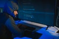 Hacker Using Multiple Computers For Stealing Data On Desk Royalty Free Stock Photo
