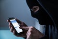 Hacker Using Smart Phone To Steal Data