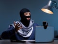 Hacker wearing balaclava mask hacking computer