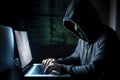 Hacker working on a computer code with laptop Royalty Free Stock Photo