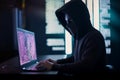 Hacker working on a computer code with laptop Royalty Free Stock Photo