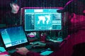 Hackers breaking server using computers. Cybercrime concept. Royalty Free Stock Photo