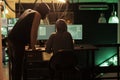 Hackers coding malicious software, cracking database password Royalty Free Stock Photo