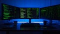 Hackers Command Center with Multiple Coding Screens Royalty Free Stock Photo