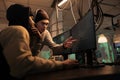 Hackers discussing computer system hacking, coding malicious software Royalty Free Stock Photo