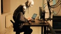 Hackers with white masks hacking network to steal passwords