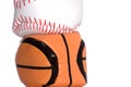 Hackey sac baseball and basketaball stacked Royalty Free Stock Photo