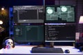 Hacking code scripts running on computer system monitors Royalty Free Stock Photo