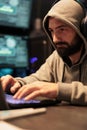 Hacking developer using computer to break system Royalty Free Stock Photo