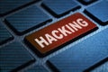 Hacking keyword on keyboard Royalty Free Stock Photo